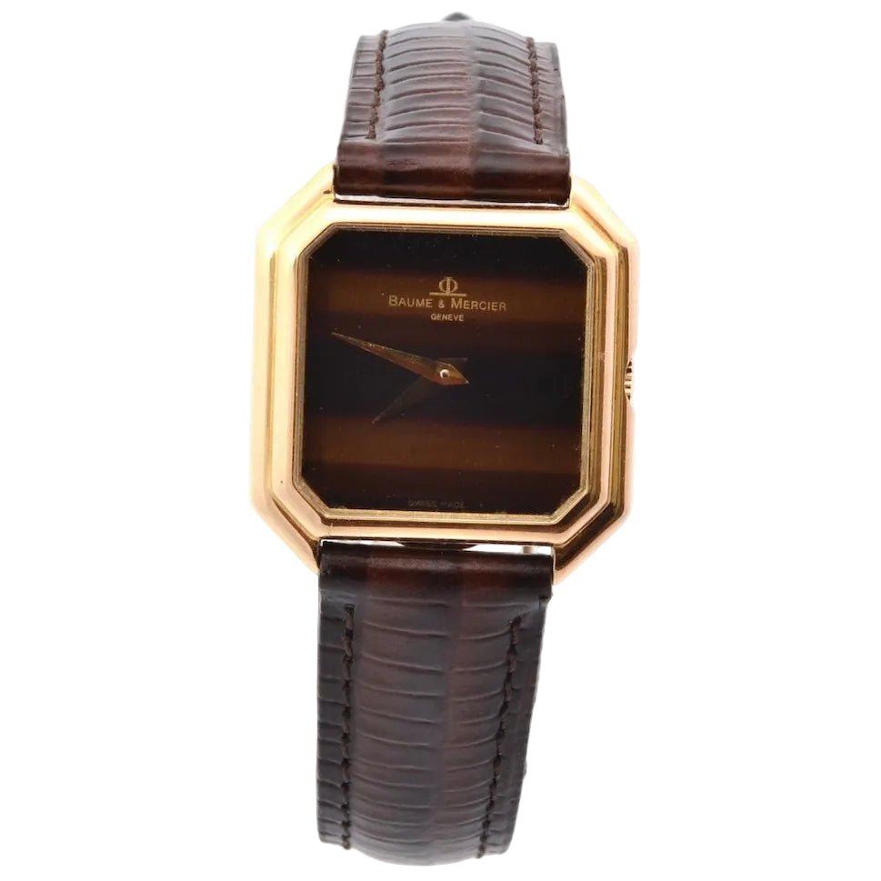 Montre BAUME & MERCIER en or jaune, cuir et saphir - Castafiore