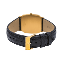 Montre BAUME & MERCIER en or jaune, quartz et cuir - Castafiore