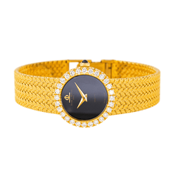 Montre BAUME & MERCIER en or jaune, quartz et diamants - Castafiore