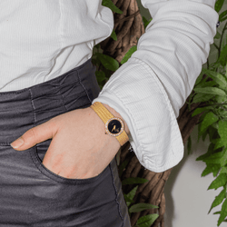 Montre BAUME & MERCIER en or jaune, quartz et diamants - Castafiore