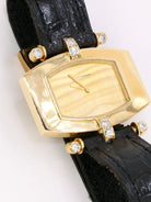 Montre BOUCHERON or jaune diamants bracelet cuir noir - Castafiore