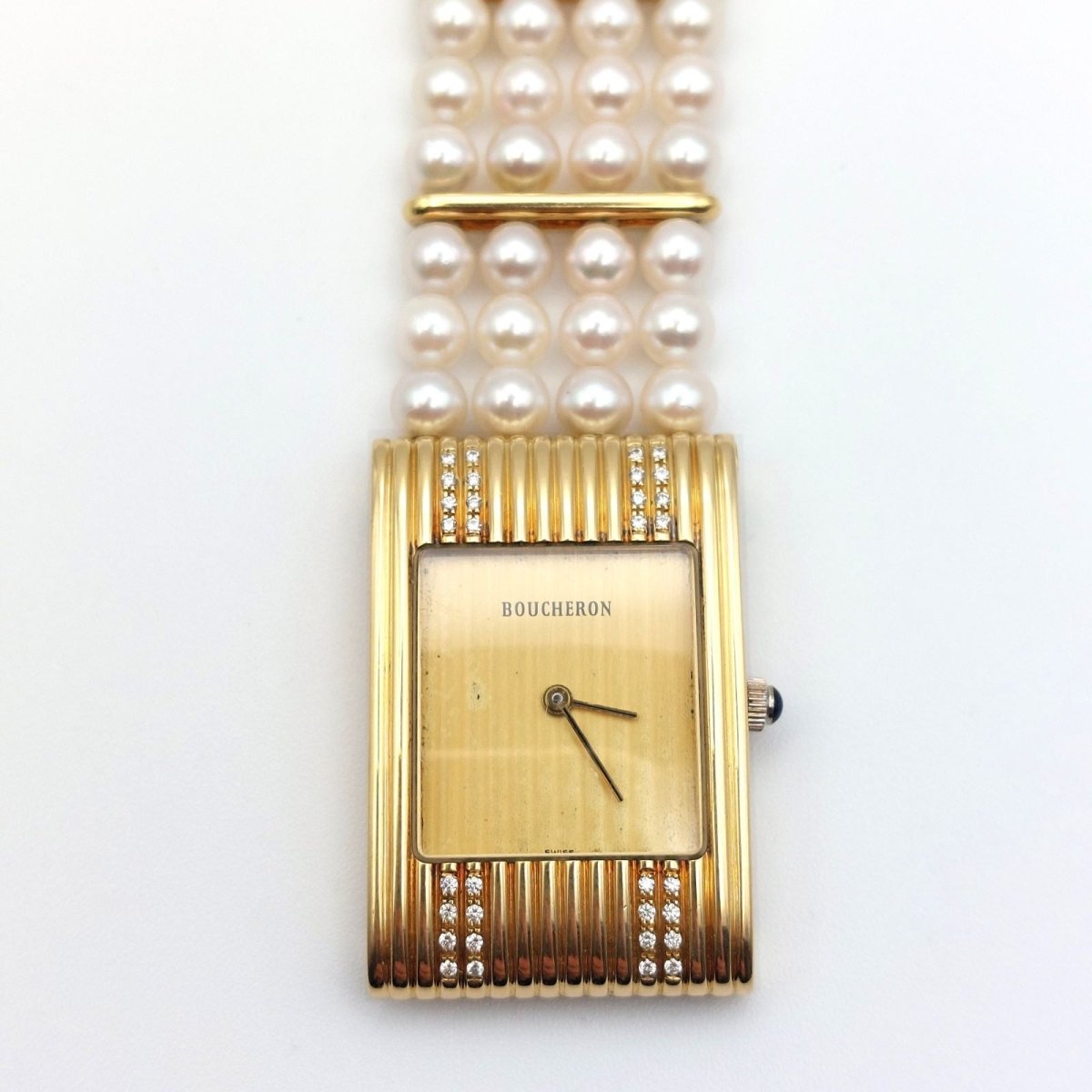 Montre BOUCHERON "Reflet" en or jaune et diamants - Castafiore