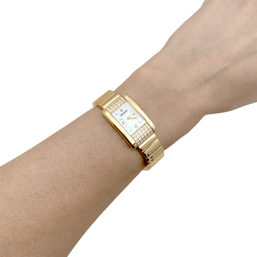Montre BOUCHERON « Reflet Icare » en or jaune, argent et diamants - Castafiore