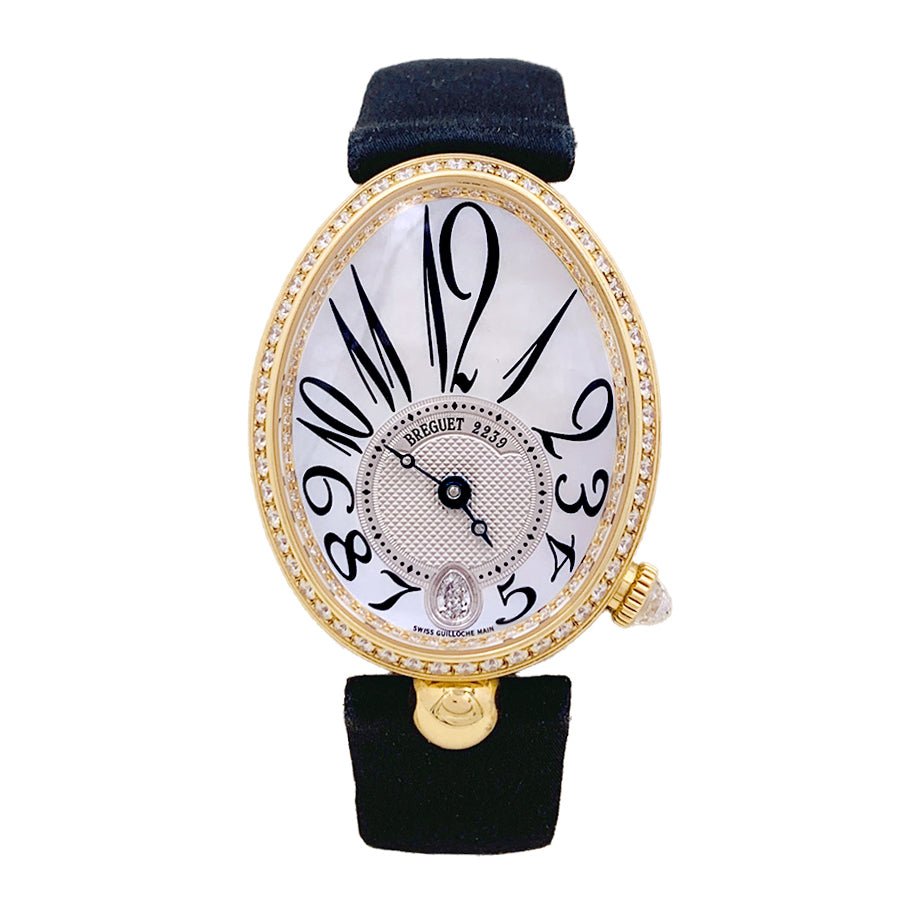 Montre BREGUET "Reine de Naples" en or rose, diamants, nacre et satin - Castafiore