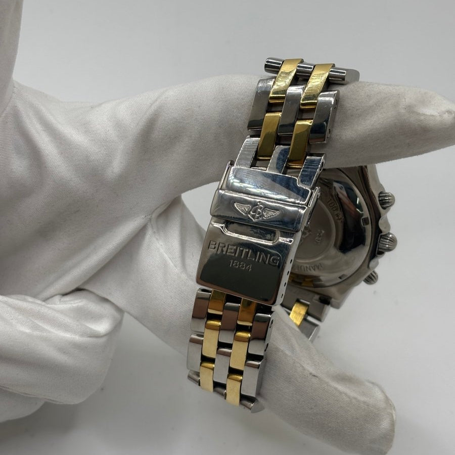Montre Breitling Chronomat en or et acier - Castafiore