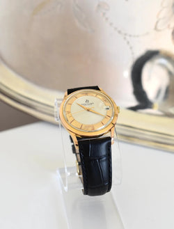 Montre BREITLING Réf. 4002, en plaqué or et acier - Cadran bicolore, Venus 227, Vers 1956. - Castafiore