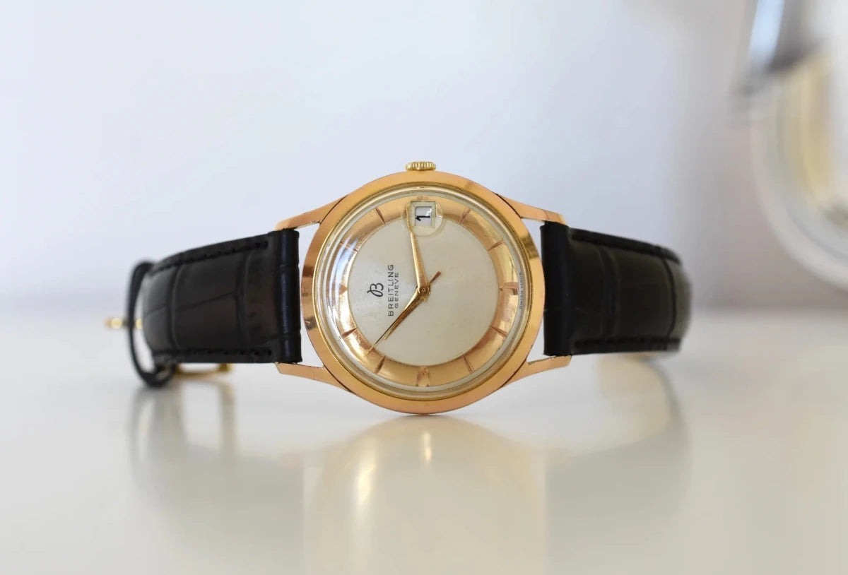 Montre BREITLING Réf. 4002, en plaqué or et acier - Cadran bicolore, Venus 227, Vers 1956. - Castafiore