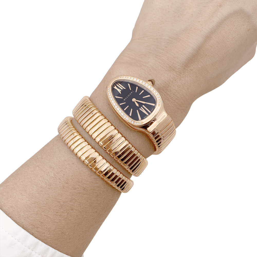 Montre Bulgari, “Serpenti Tubogas”, en or rose et diamants - Castafiore
