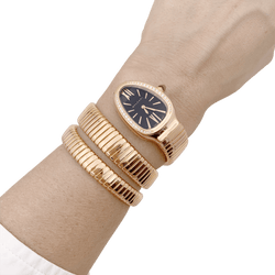 Montre Bulgari, “Serpenti Tubogas”, en or rose et diamants - Castafiore