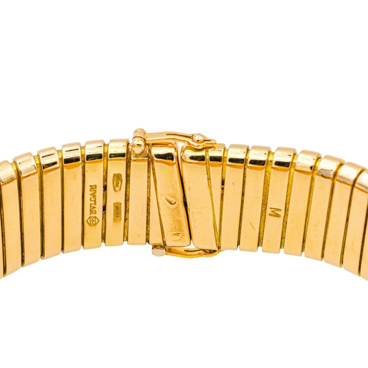Montre BULGARI "Tubogas" en or jaune, quartz et saphir - Castafiore