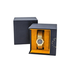 Montre BULGARI "Tubogas" en or jaune, quartz et saphir - Castafiore