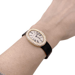 Montre CARTIER "Baignoire", or jaune, argent, cuir et diamants. - Castafiore