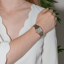 Montre CARTIER "Panthère" en or jaune, acier et quartz - Castafiore