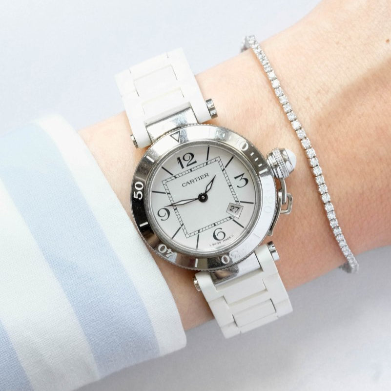 Montre CARTIER Pasha Seat Lady en acier et caoutchouc - Castafiore