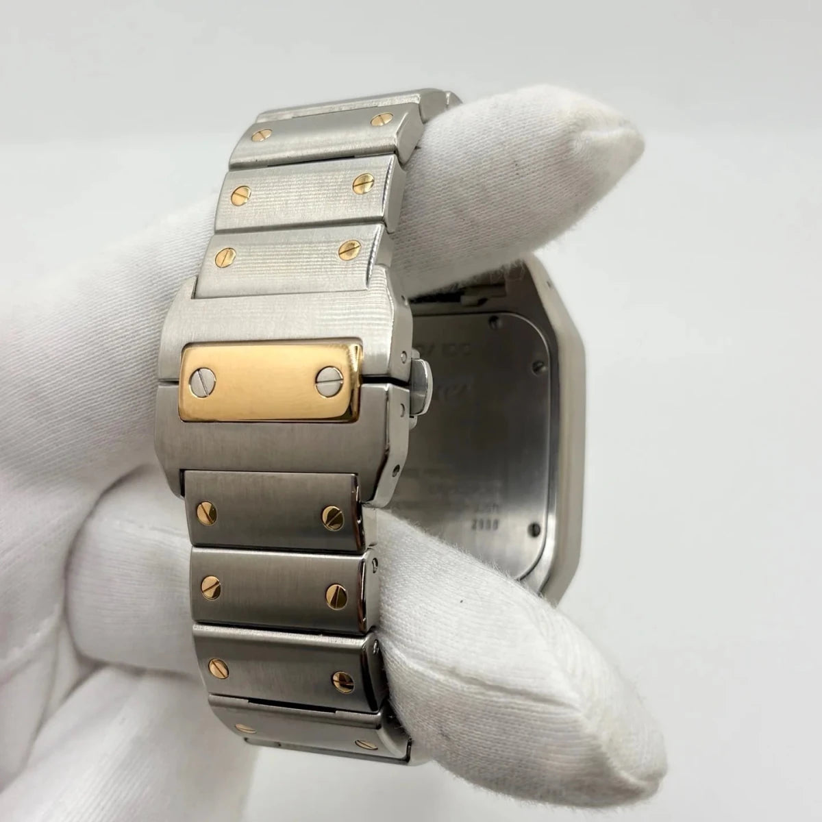 Montre CARTIER "Santos 100" en or jaune et acier inoxydable - Castafiore