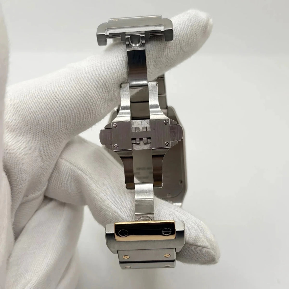 Montre CARTIER "Santos 100" en or jaune et acier inoxydable - Castafiore