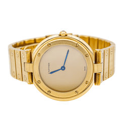 Montre CARTIER "Santos Vendôme" en or jaune et saphir - Castafiore