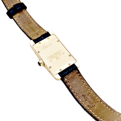 Montre CARTIER "Tank Américaine" en or jaune, acier et cuir - Castafiore