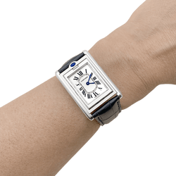 Montre CARTIER "Tank Basculante" en acier, argent et cuir - Castafiore