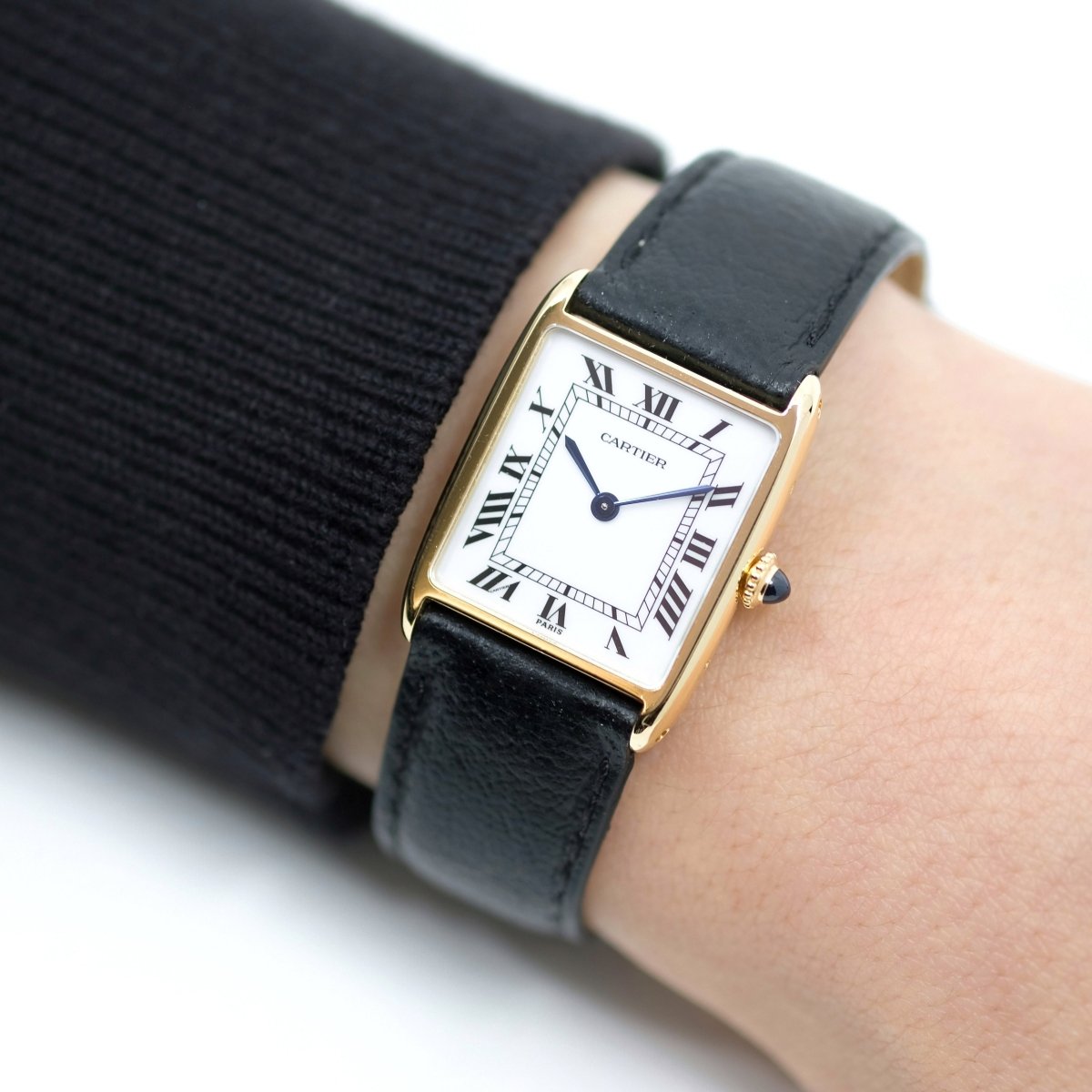 Montre CARTIER "Tank" en or jaune, cuir et saphir - Castafiore