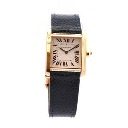 Montre CARTIER "Tank" en or jaune, cuir, saphir et quartz - Castafiore