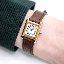 Montre CARTIER "Tank" en or jaune et cuir - Castafiore