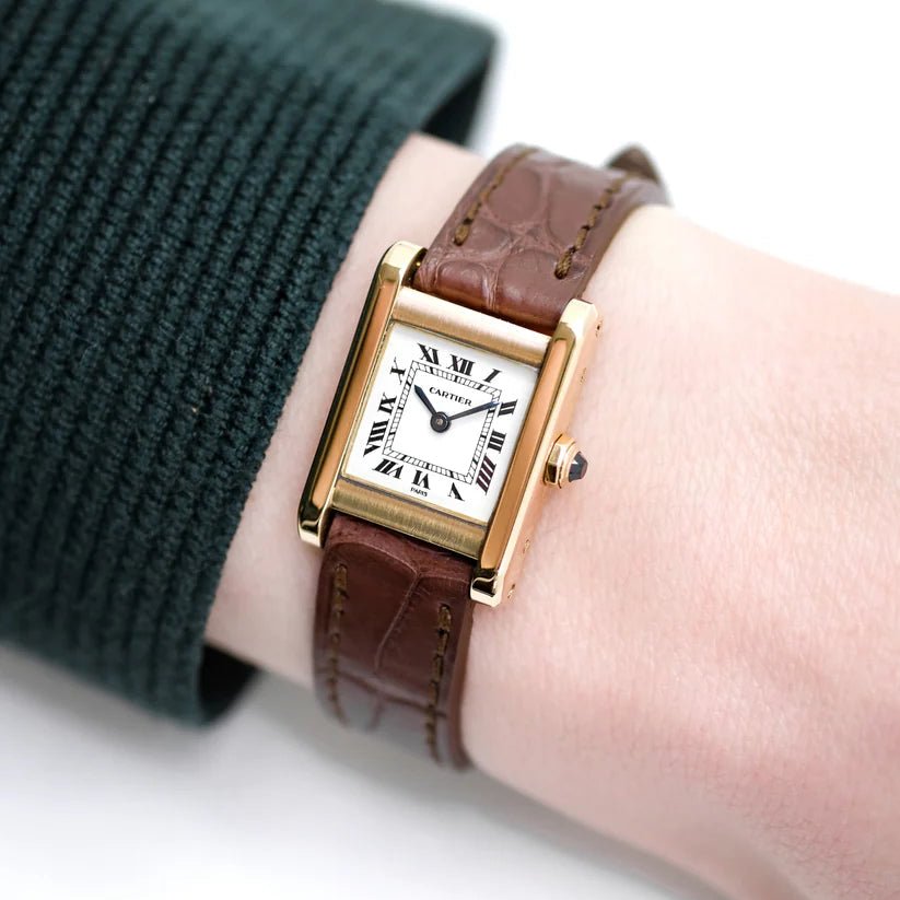 Montre CARTIER "Tank" en or jaune et cuir - Castafiore