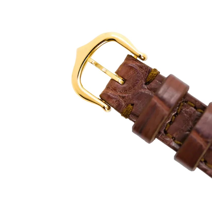 Montre CARTIER "Tank" en or jaune et cuir - Castafiore