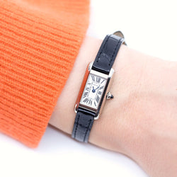 Montre CARTIER "Tank Louis Cartier" en or blanc, cuir et saphir - Castafiore