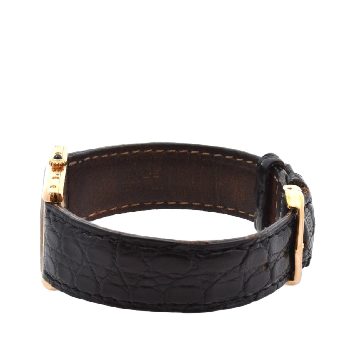 Montre CARTIER "Tank Louis Cartier" en or jaune, cuir, saphir et quartz - Castafiore