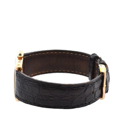 Montre CARTIER "Tank Louis Cartier" en or jaune, cuir, saphir et quartz - Castafiore