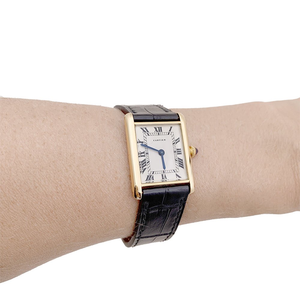 Montre CARTIER "Tank Louis Cartier Extra Plate", or jaune et cuir - Castafiore