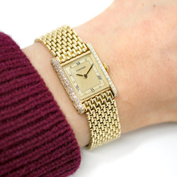 Montre CARTIER Tank Louis M en or jaune et diamants