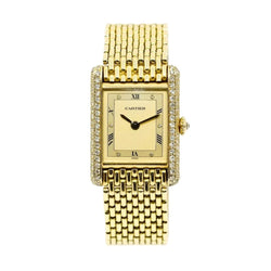 Montre CARTIER "Tank Louis" M en or jaune et diamants - Castafiore