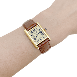 Montre Cartier "Tank Must" argent plaqué or, cuir. - Castafiore