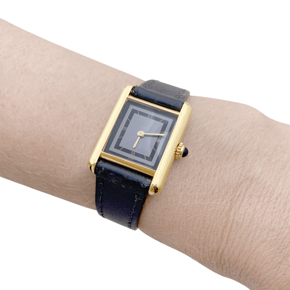 Montre CARTIER, "Tank Must", argent plaqué or et cuir - Castafiore