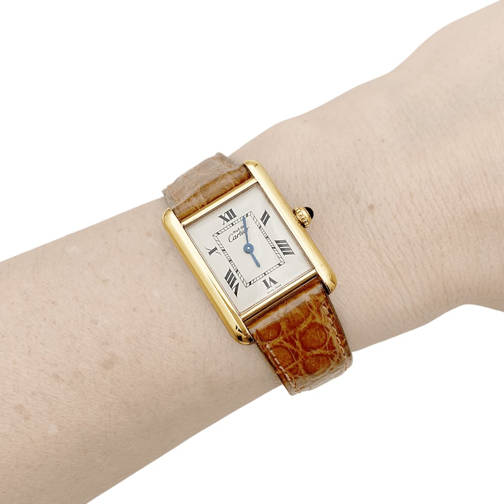 Montre CARTIER "Tank Must" en argent, acier et cuir - Castafiore