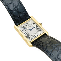 Montre CARTIER "Tank Solo" en or jaune, argent, cuir, acier et spinelle - Castafiore