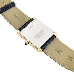 Montre CARTIER "Tank Solo" en or jaune, argent, cuir, acier et spinelle - Castafiore