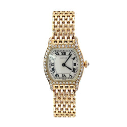 Montre CARTIER "Tortue" en or jaune et diamants - Castafiore