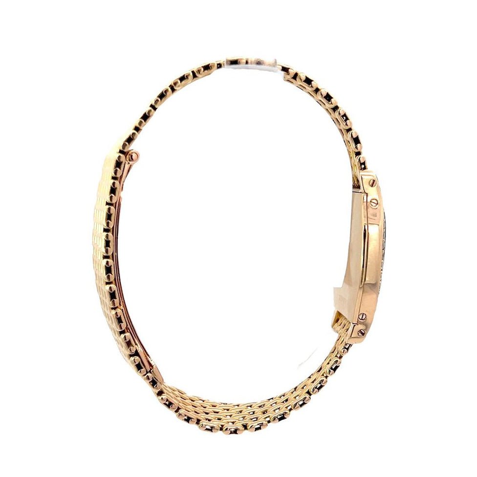 Montre CARTIER "Tortue" en or jaune et diamants - Castafiore