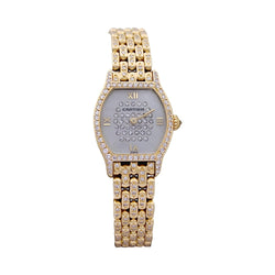 Montre Cartier "Tortue" or jaune, diamants, nacre. - Castafiore