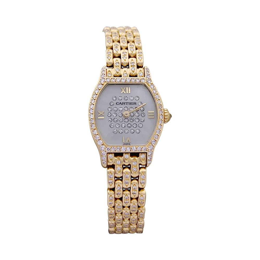 Montre Cartier "Tortue" or jaune, diamants, nacre. - Castafiore