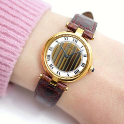 Montre CARTIER "Vendôme Must Trinity" en or blanc, or jaune, or rose et cuir - Castafiore