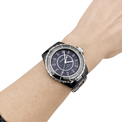 Montre Chanel, "J12", céramique noire, rubis, acier. - Castafiore