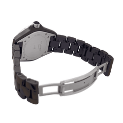 Montre Chanel, "J12", céramique noire, rubis, acier. - Castafiore