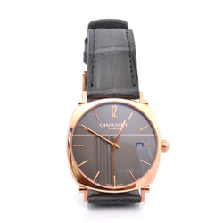 Montre CHAUMET "Dandy" en or, cuir et saphir - Castafiore