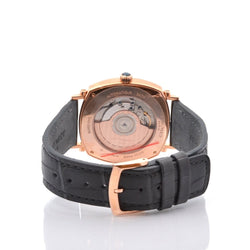 Montre CHAUMET "Dandy" en or, cuir et saphir - Castafiore