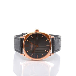 Montre CHAUMET "Dandy" en or, cuir et saphir - Castafiore