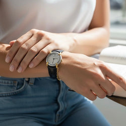 Montre CHAUMET "Élysées" en or jaune, acier, cuir, quartz et diamant - Castafiore